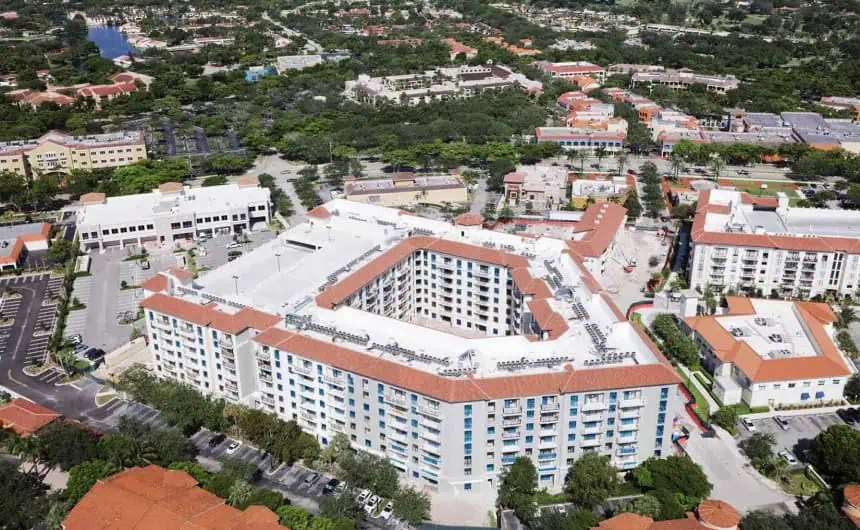 Aerial view of Miami apartment complex with durable red-tiled roofs