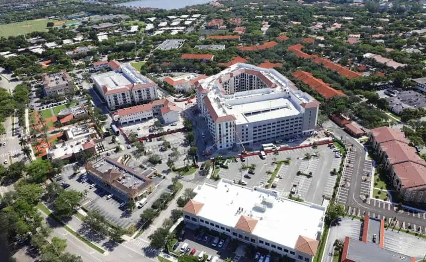 Aerial view of urban commercial buildings with flat roofs near 6600 Main Street.