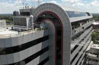 Aerial view: Commercial rooftop with satellite dishes in Boston