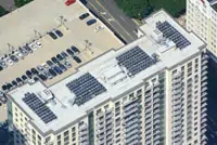 Aerial View: San Francisco High-Rise with Solar Roof Panels