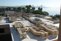 Rooftop HVAC systems on commercial flat roof, San Diego skyline