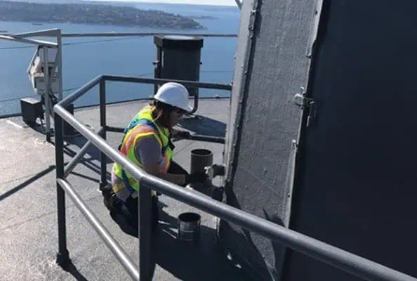 Seattle Space Needle with liquid applied coating in commercial roofing system