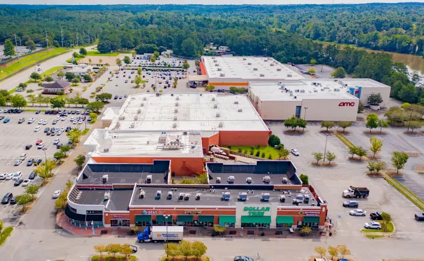 Aerial view of Jubilee Square roofs featuring Dollar Tree and AMC.