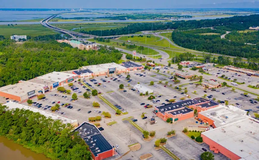 Aerial view of Jubilee Square shopping center with expansive flat rooftops.