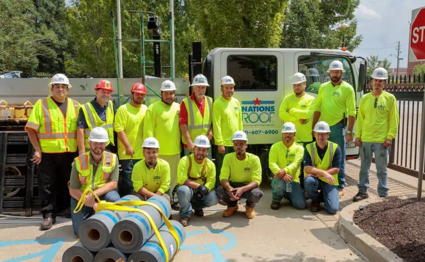 Nations Roof team with ready roofing materials for commercial installation
