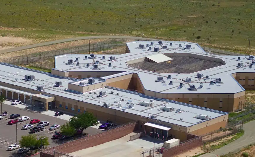 Aerial view of correctional facility roofs in Santa Fe County