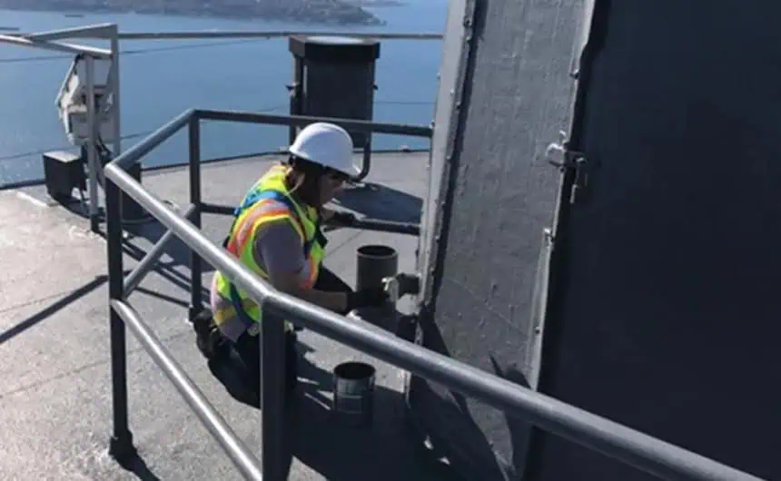 Seattle Rooftop Painting with Space Needle View, Safety Gear On