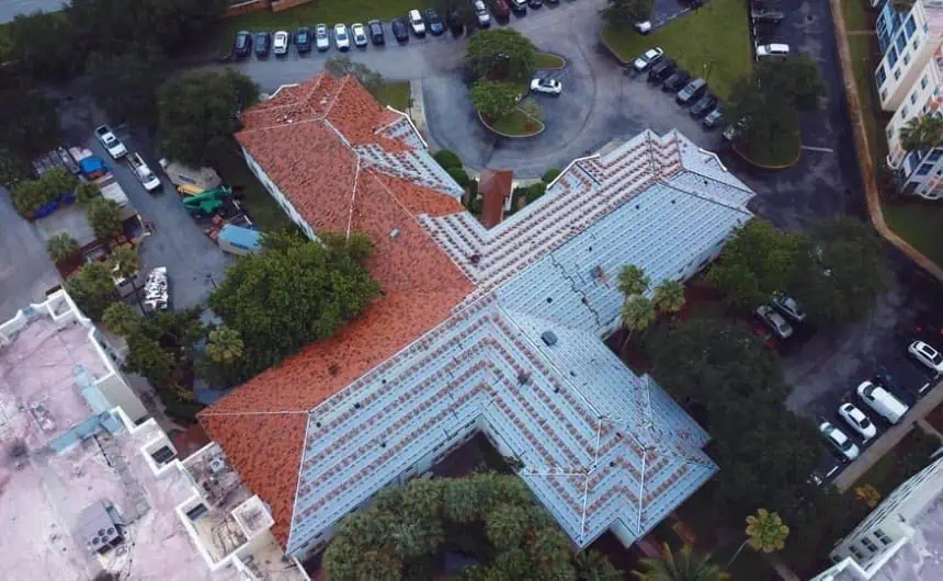 Aerial view of Stratfort Court's red-tiled roof amidst urban landscape
